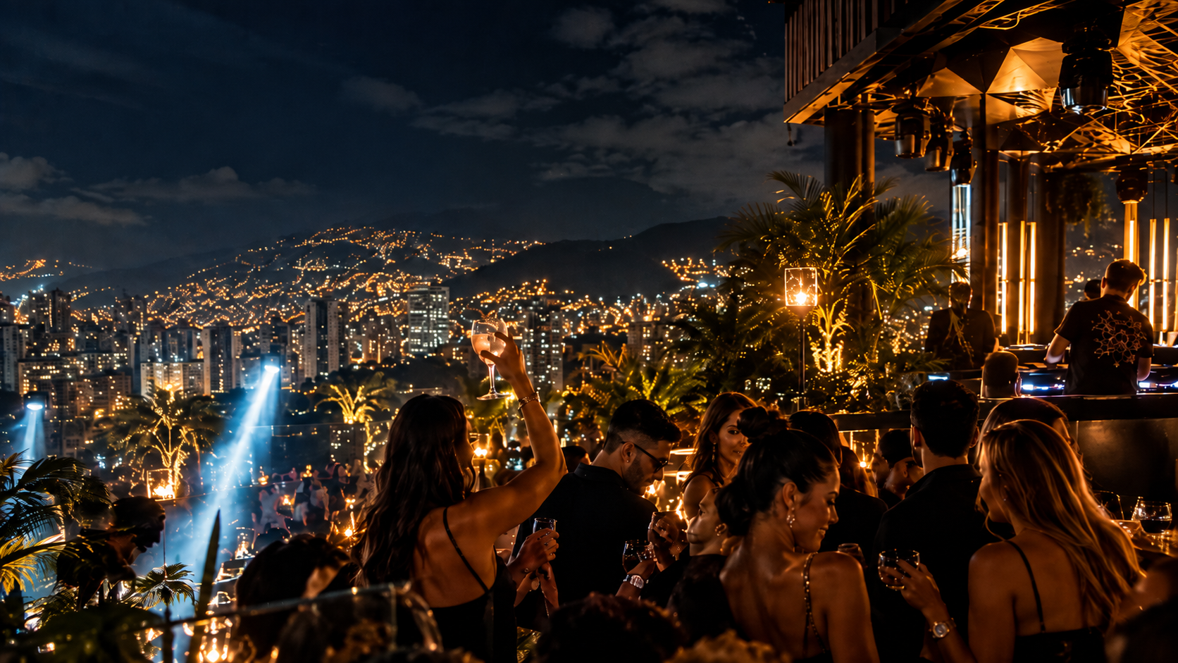 Rooftop nightlife in Medellín with city lights, cocktails and a DJ
